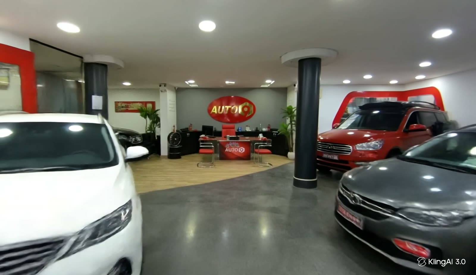 Le sol du showroom Auto 9, une lumière chaude entre les voitures